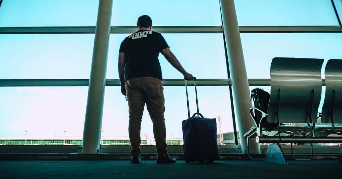 Man Holding Luggage Bag